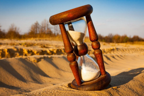Hourglass in sands